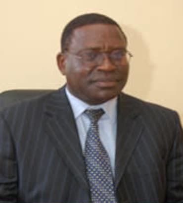 Mr. John E. Kirimi